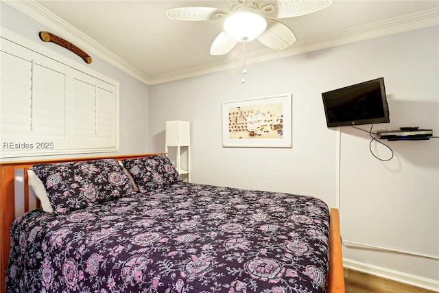 bedroom featuring crown molding, ceiling fan, and hardwood / wood-style flooring