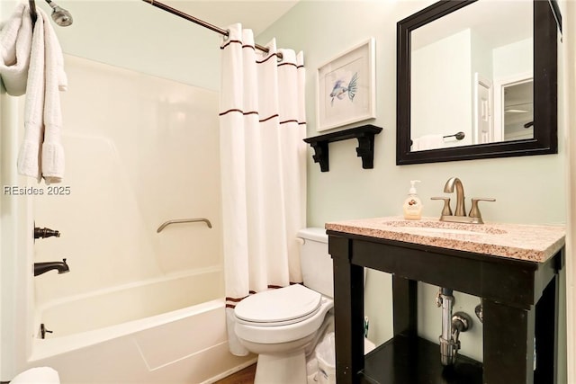 full bathroom featuring shower / tub combo, toilet, and sink