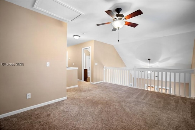 bonus room with ceiling fan, lofted ceiling, and carpet floors