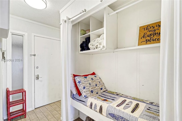 bedroom with a textured ceiling