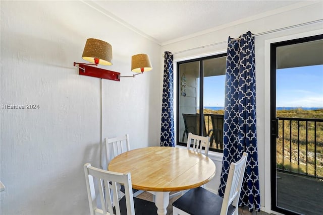 dining room featuring ornamental molding