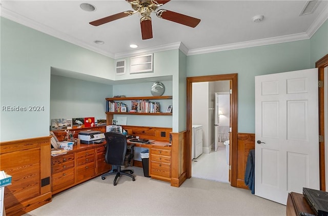 office space featuring light colored carpet, ornamental molding, independent washer and dryer, and ceiling fan