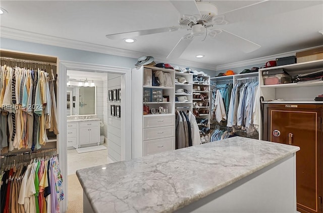 spacious closet featuring ceiling fan