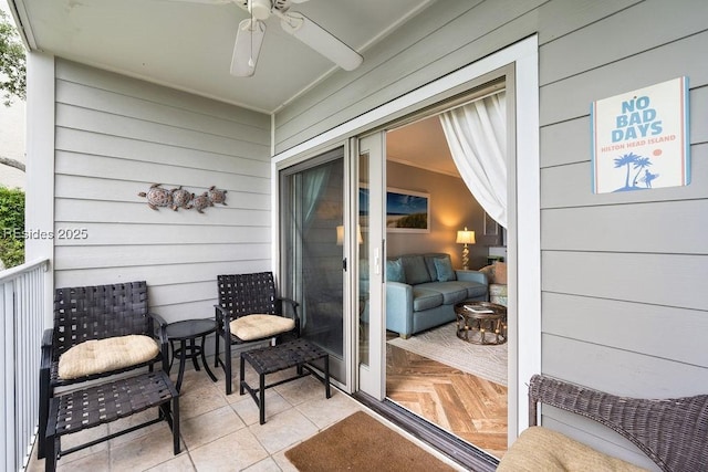 balcony featuring ceiling fan