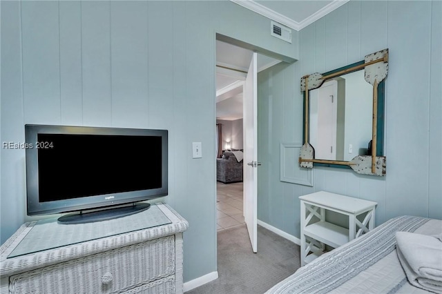 bedroom with light colored carpet and ornamental molding