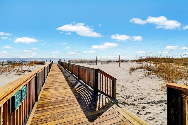 surrounding community featuring a water view