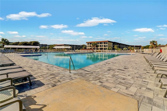 view of pool with a patio area