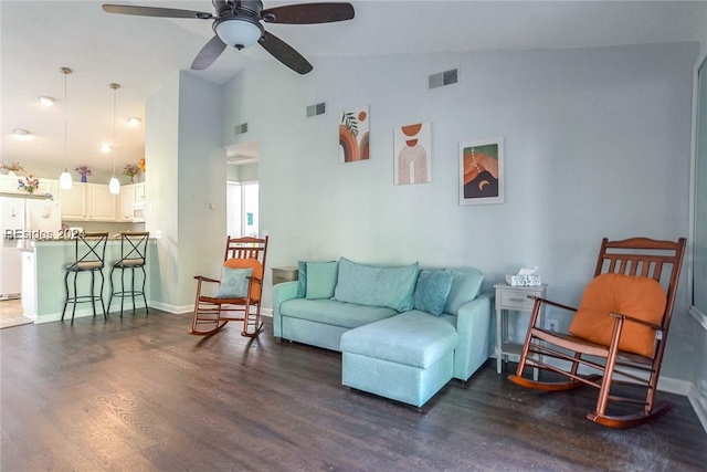 living room with dark hardwood / wood-style flooring, high vaulted ceiling, and ceiling fan