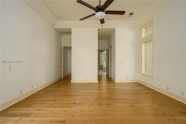 spare room featuring light hardwood / wood-style flooring and ceiling fan