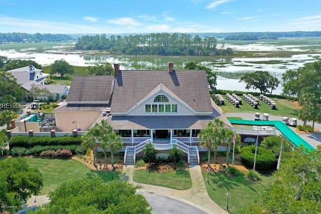 drone / aerial view with a water view