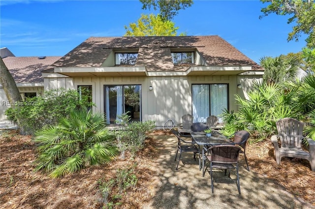 back of property with a patio area