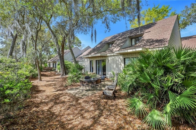 rear view of property with a patio