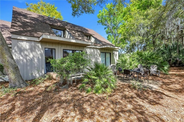 back of property featuring a patio