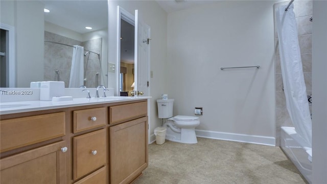 full bathroom featuring vanity, toilet, and shower / tub combo with curtain