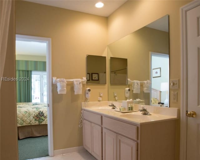 bathroom featuring vanity and tile patterned floors