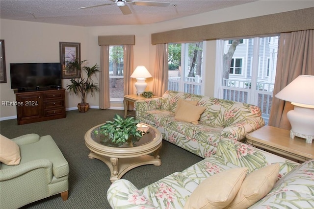 carpeted living room with ceiling fan and a textured ceiling