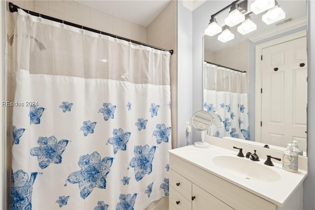 bathroom featuring vanity and a shower with curtain