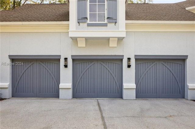 exterior space with a garage