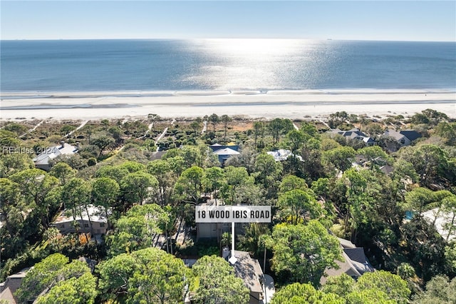 aerial view featuring a water view and a beach view