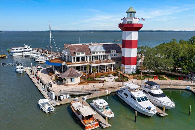 birds eye view of property featuring a water view