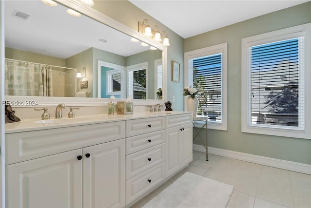 bathroom with vanity, tile patterned floors, and a shower with shower curtain