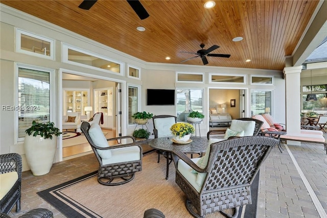 view of patio featuring ceiling fan