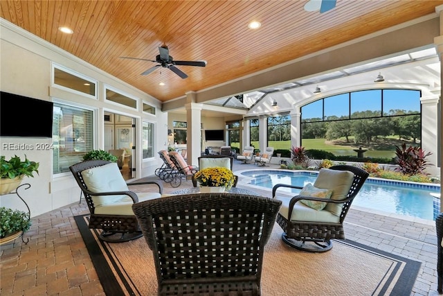 exterior space featuring a lanai and ceiling fan