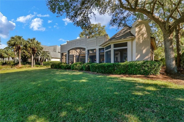 view of front of property with a front lawn