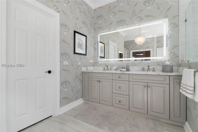 bathroom featuring vanity and ornamental molding