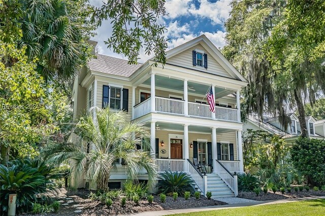 view of front of house featuring a balcony and a porch