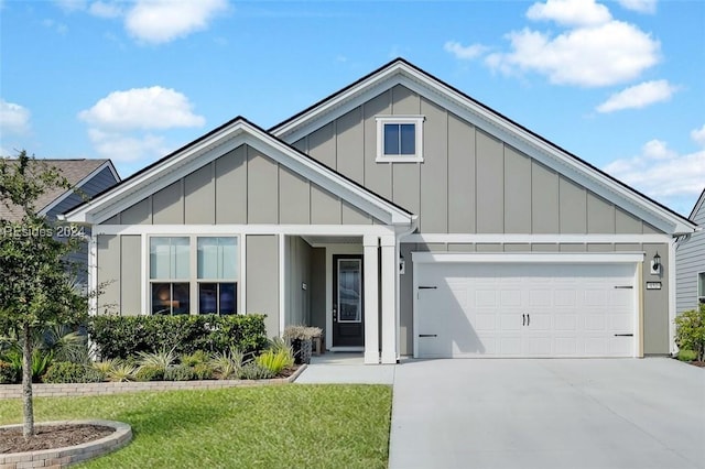 view of front facade with a garage and a front lawn