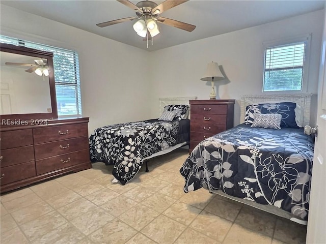 bedroom featuring ceiling fan