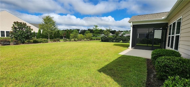 view of yard with a sunroom