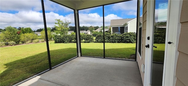 unfurnished sunroom with a healthy amount of sunlight