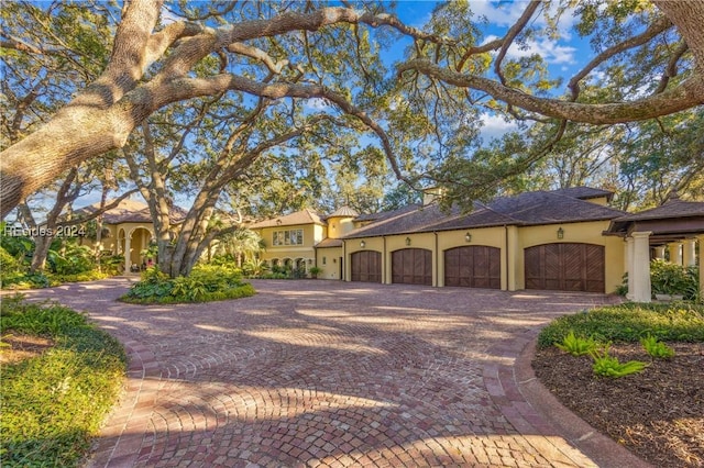 view of front of property featuring a garage