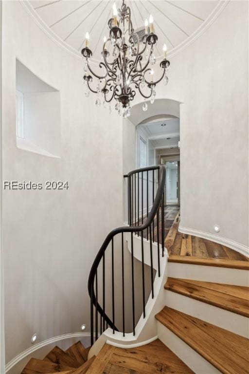 staircase with crown molding