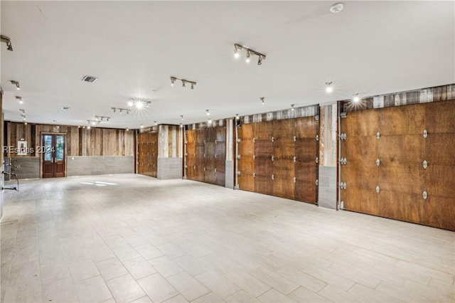 garage with wood walls