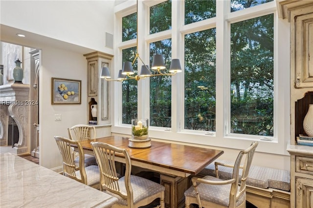 dining area with a chandelier and a wealth of natural light