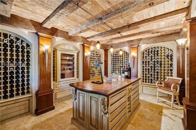 wine area with brick ceiling and beam ceiling