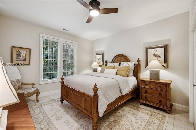 bedroom featuring ceiling fan and light tile patterned floors