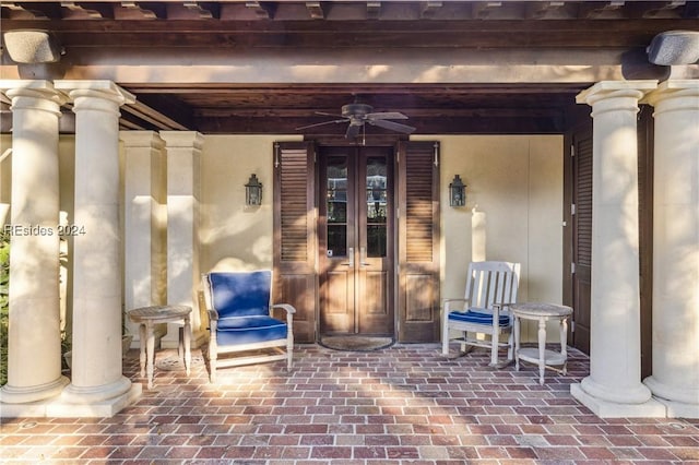 doorway to property featuring ceiling fan and french doors