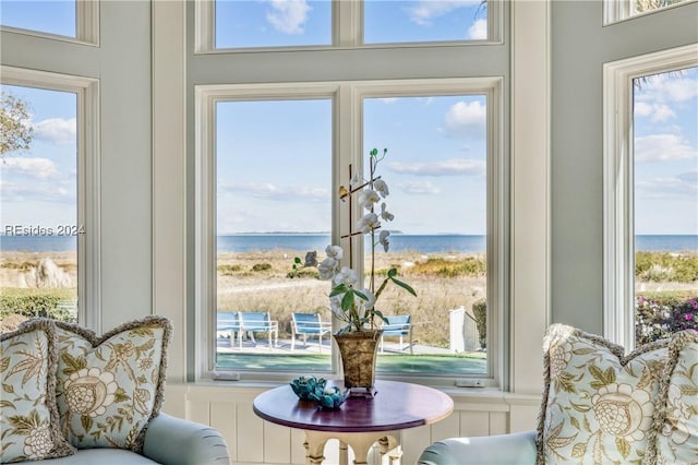 dining area featuring a water view