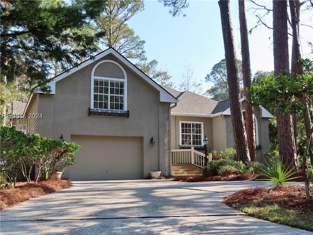 view of front of property with a garage