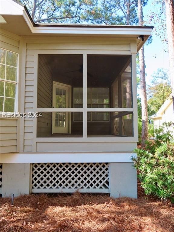 view of home's exterior featuring a sunroom