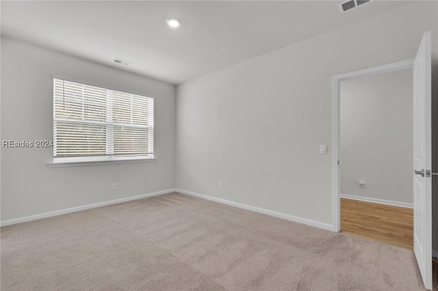 view of carpeted spare room