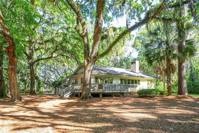 view of front of house with a wooden deck