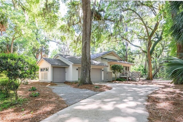 single story home with a garage