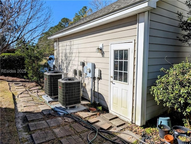 exterior space with central air condition unit