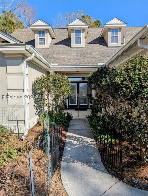 doorway to property featuring french doors