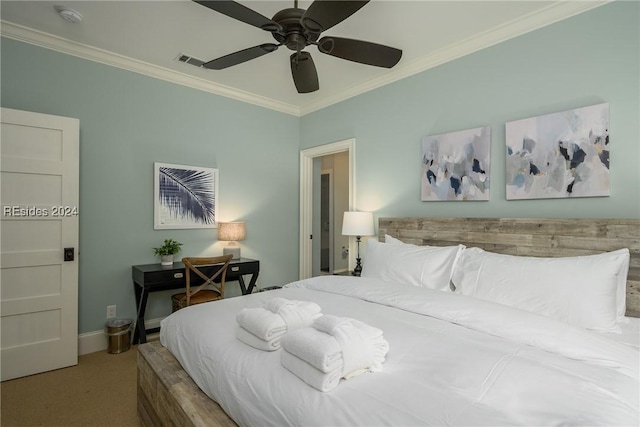 bedroom with ornamental molding and ceiling fan